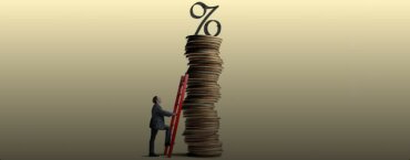 A man climbs a ladder on a hill of coins.