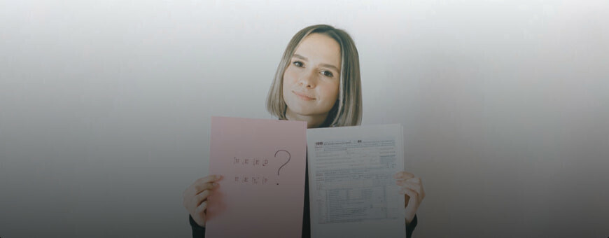 A woman holding documents