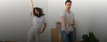 A girl and man dancing.
