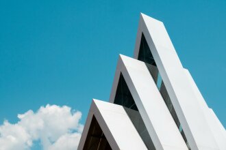 white building and clear blue sky.