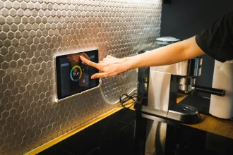 An image of a hand controlling the smart system.